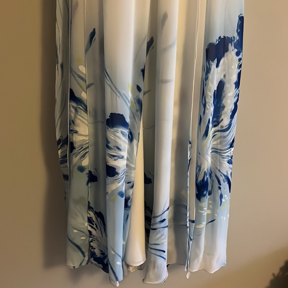 A Jasz Couture Beautiful white with blue florals formal dress with cut outs. - Picture 5 of 10